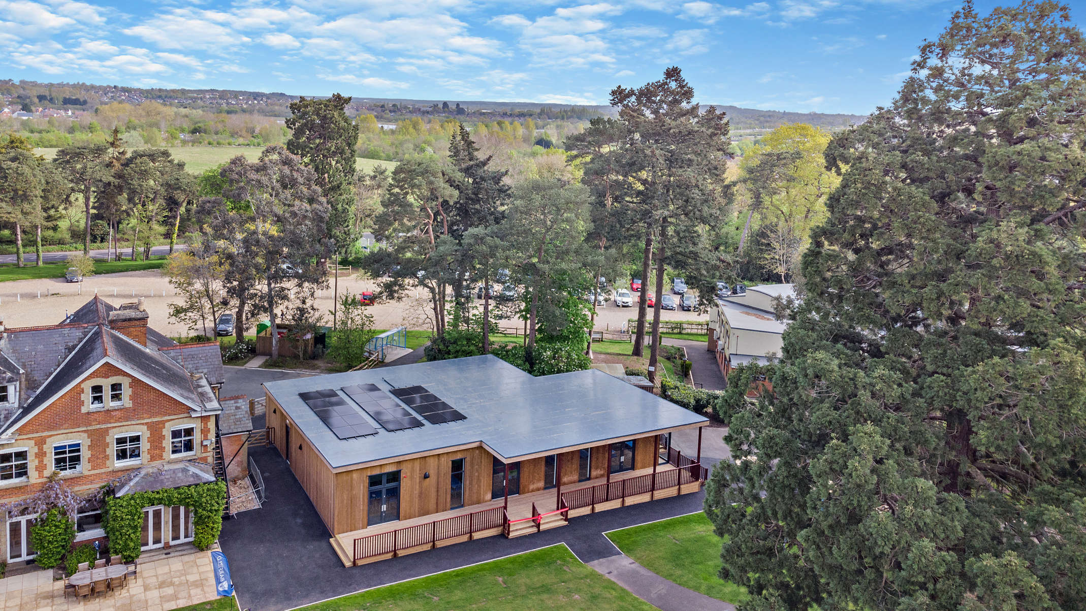 Drone view of solar panels on a school